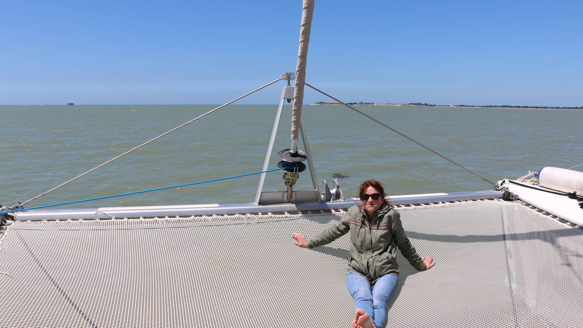 Sur le trampoline du catamaran Vertige